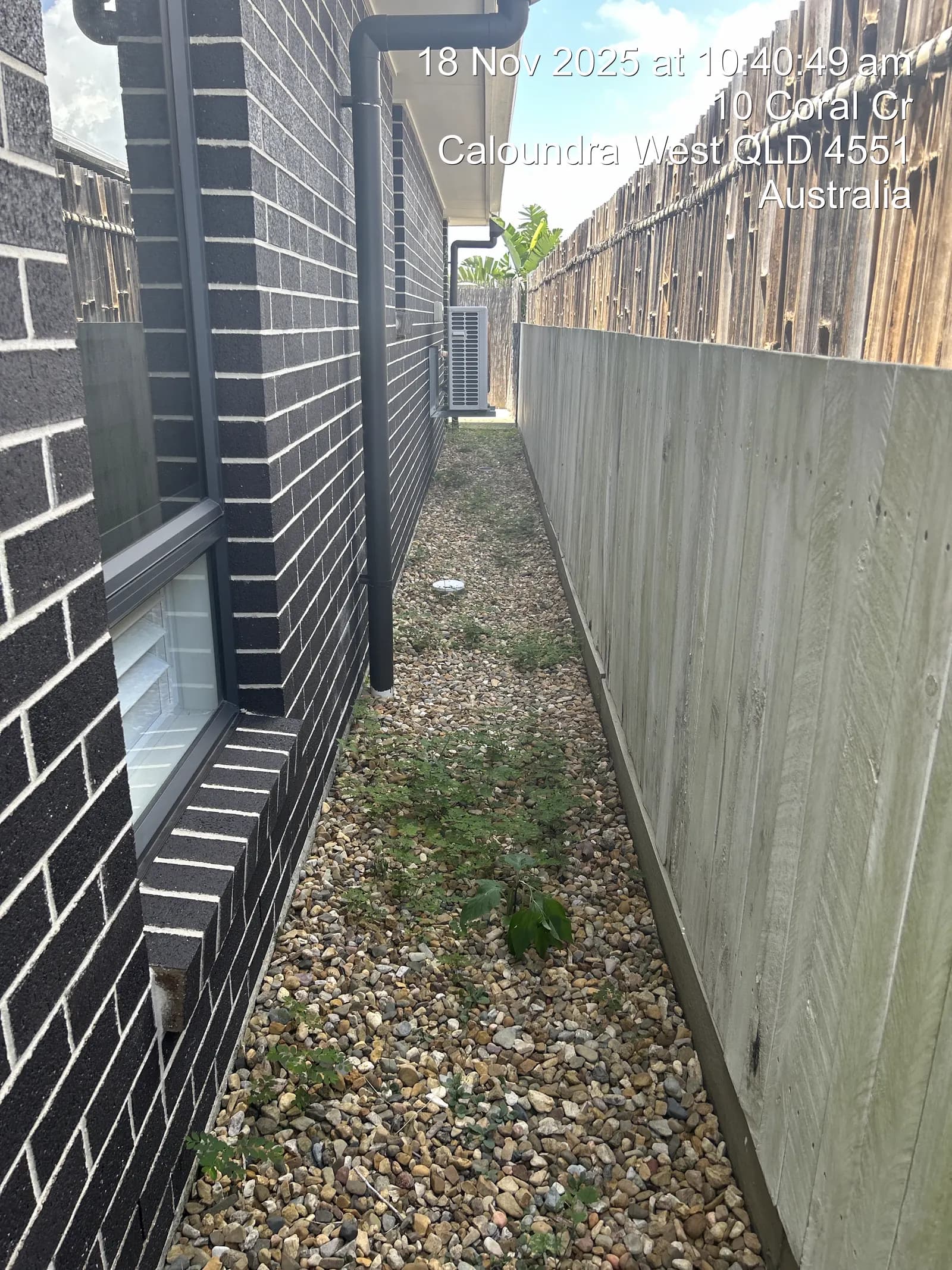 Pebble bed and deck at a Caloundra West property, angle one